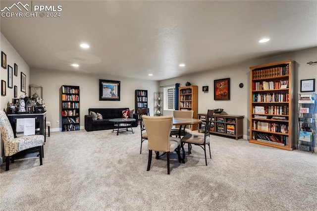 view of carpeted dining space