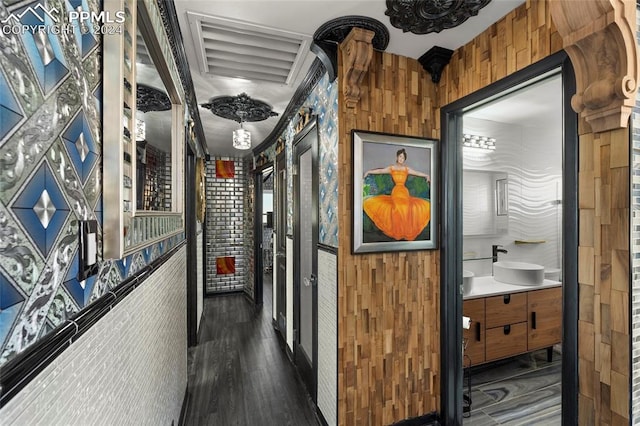 hallway featuring sink and dark hardwood / wood-style flooring