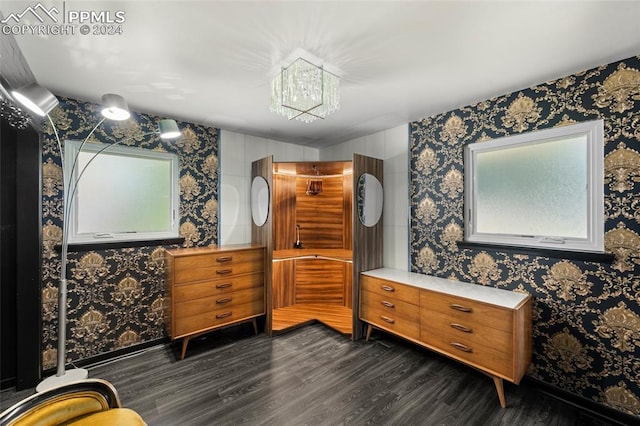 bathroom featuring vanity, a chandelier, and wood-type flooring