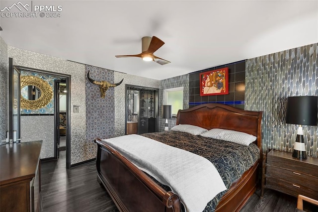 bedroom featuring ceiling fan and wood-type flooring