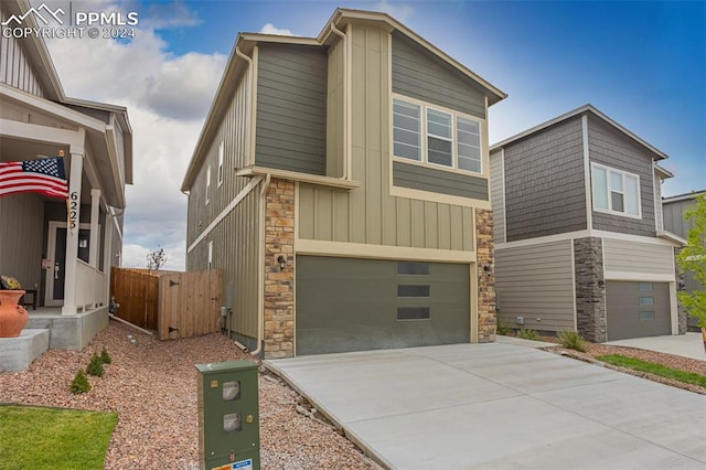 view of front of property with a garage