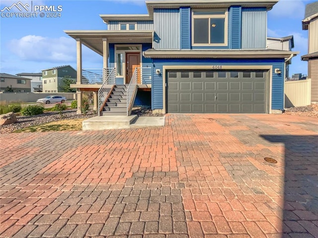 view of front of home with a garage