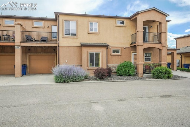 view of property featuring a garage