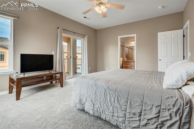 carpeted bedroom featuring connected bathroom, access to outside, and ceiling fan