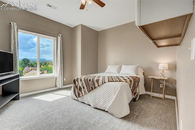 carpeted bedroom with ceiling fan