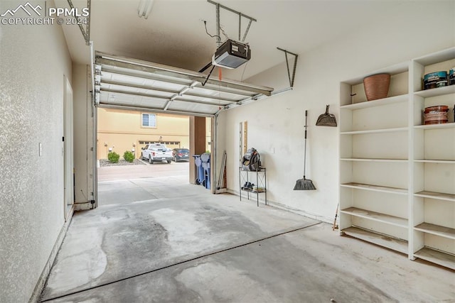 garage featuring a garage door opener