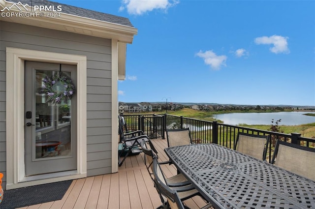 deck featuring a water view