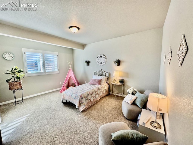 carpeted bedroom featuring a textured ceiling