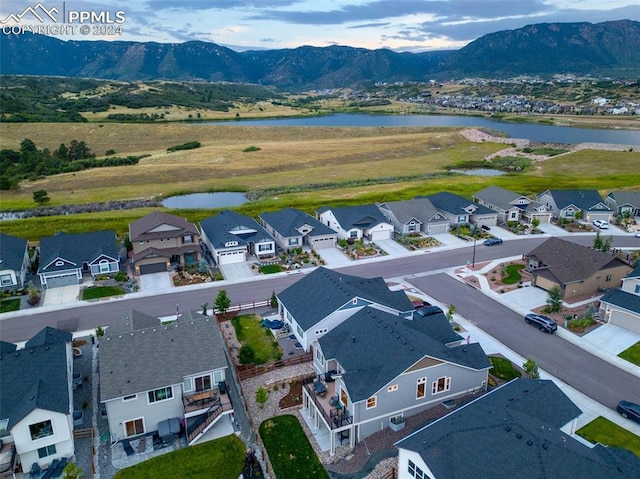 aerial view with a water and mountain view