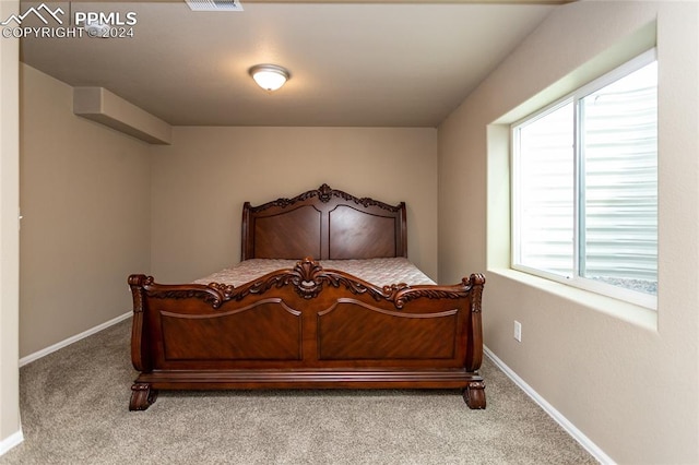 bedroom featuring carpet flooring