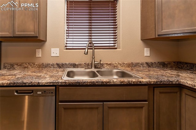 kitchen with stainless steel dishwasher and sink