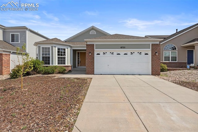 single story home with a garage