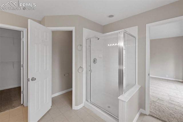 bathroom with an enclosed shower