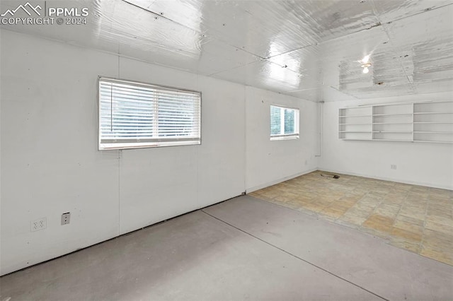 empty room featuring concrete flooring