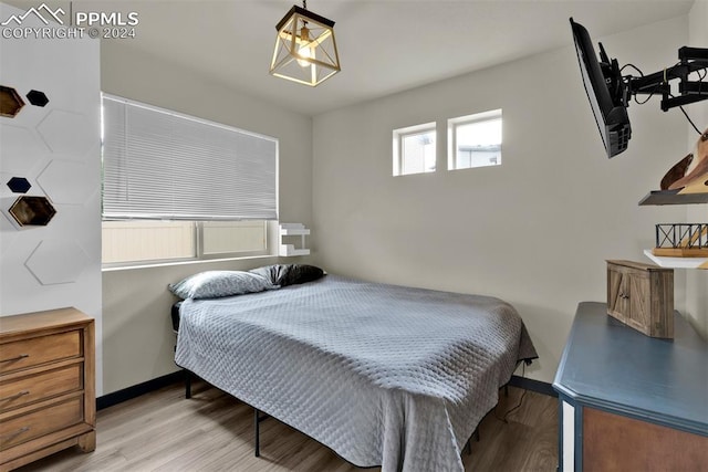 bedroom featuring light wood-type flooring