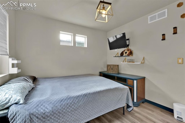 bedroom featuring light wood-type flooring