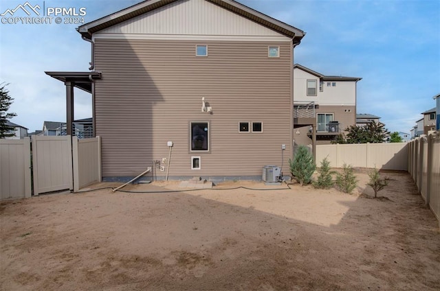 back of property with cooling unit