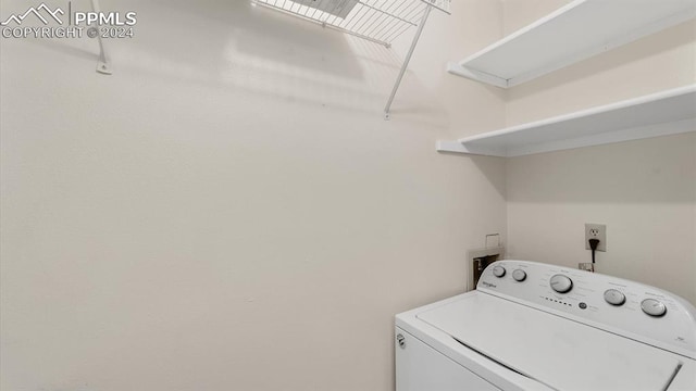 laundry room with washer / clothes dryer