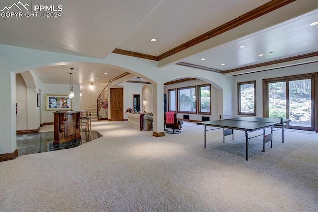 4950 Longwood Pt, Colorado Springs, CO 80906 - game room featuring a dry bar, carpet, arched walkways, and ornamental molding