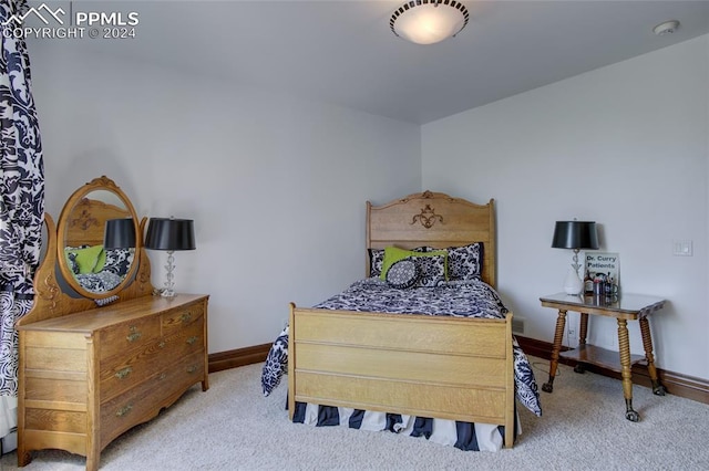 4950 Longwood Pt, Colorado Springs, CO 80906 - bedroom with baseboards and light colored carpet