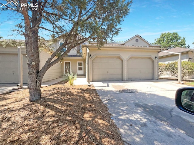 view of front of home with a garage