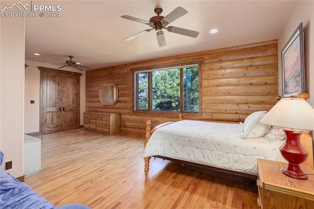 bedroom featuring a ceiling fan, wood finished floors, and recessed lighting