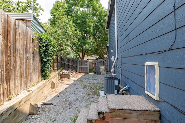 view of yard featuring central AC