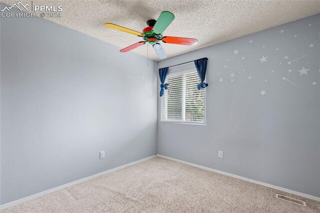 basement featuring light carpet