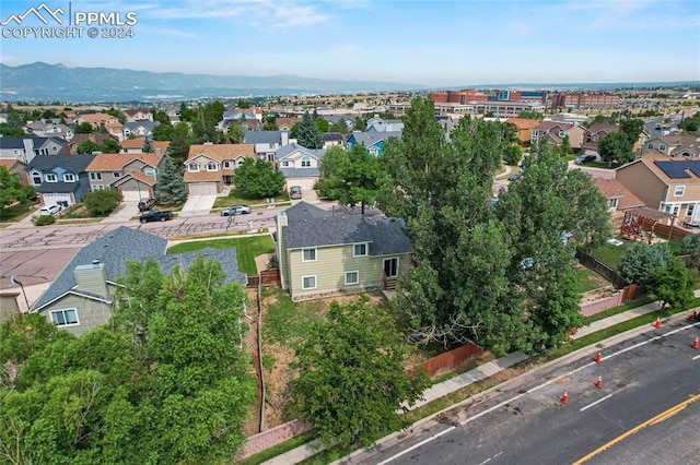 drone / aerial view featuring a mountain view