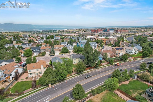 drone / aerial view featuring a mountain view