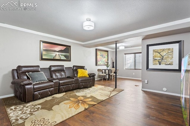 7848 Chasewood Loop, Colorado Springs, CO 80908 - living room with a textured ceiling, wood finished floors, ornamental molding, and baseboards