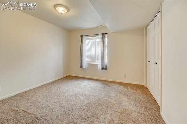 view of carpeted spare room