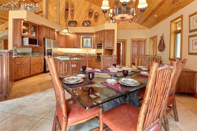 dining room featuring light tile patterned floors, high vaulted ceiling, a notable chandelier, and wood ceiling