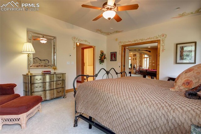 bedroom with carpet, ceiling fan, and billiards