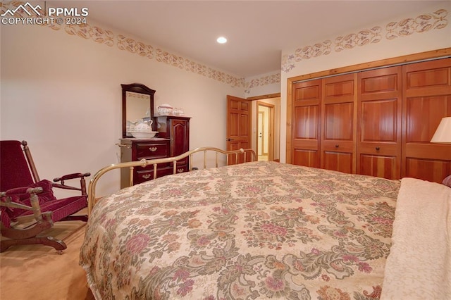 carpeted bedroom with a closet