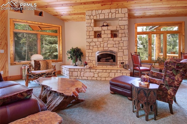 carpeted living room featuring lofted ceiling, a fireplace, and wooden ceiling