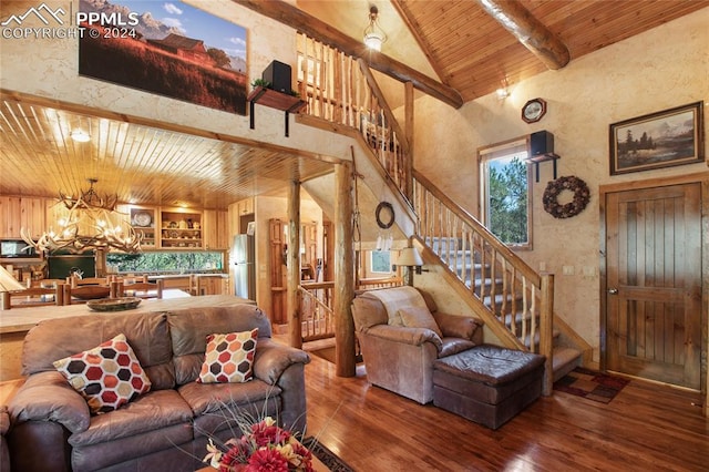 living room with hardwood / wood-style flooring, wood ceiling, high vaulted ceiling, and an inviting chandelier