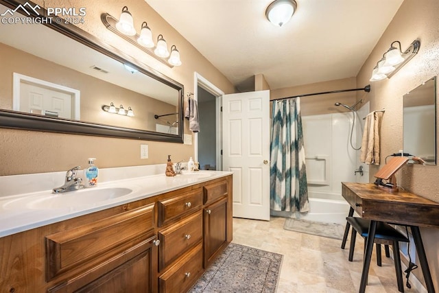 bathroom featuring tile patterned flooring, shower / bath combination with curtain, and dual bowl vanity