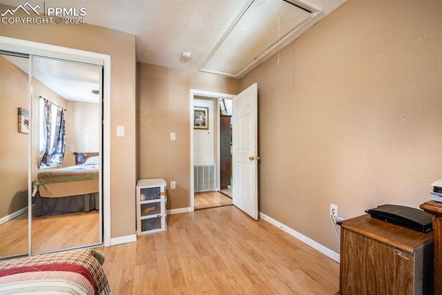 office space with light hardwood / wood-style flooring