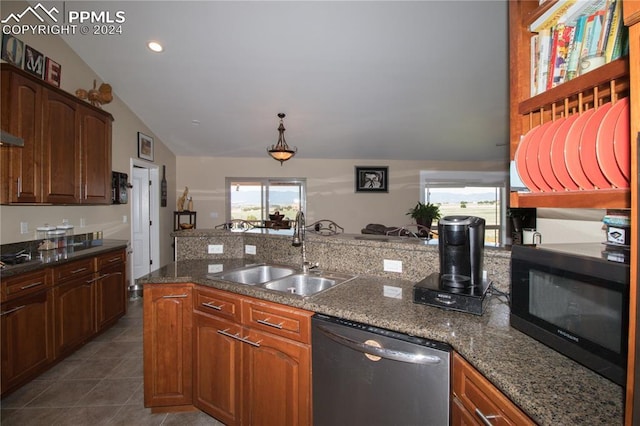 1933 Top Notch Trl, Penrose, CO 81240 - kitchen with a sink, dark tile patterned floors, vaulted ceiling, black microwave, and stainless steel dishwasher