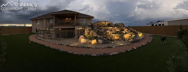 1933 Top Notch Trl, Penrose, CO 81240 - view of yard featuring a fenced backyard and a balcony