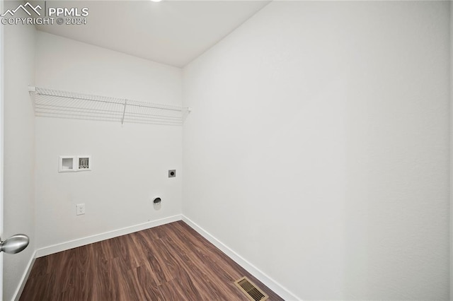 clothes washing area with laundry area, hookup for a washing machine, baseboards, and hookup for an electric dryer