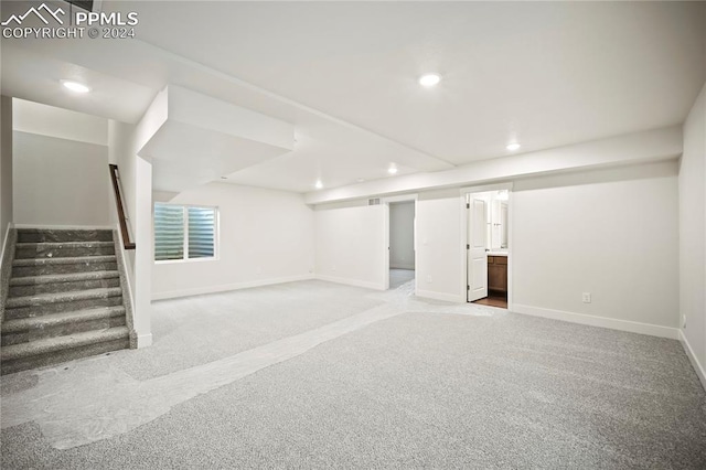 basement with light carpet