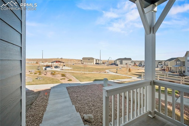 view of yard with covered porch