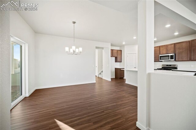 kitchen featuring gray cabinetry, sink, a center island with sink, and light wood-type flooring