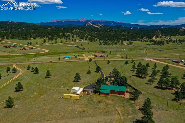 bird's eye view with a mountain view and a rural view