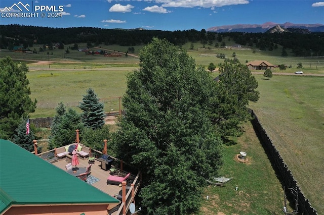 bird's eye view with a mountain view and a rural view