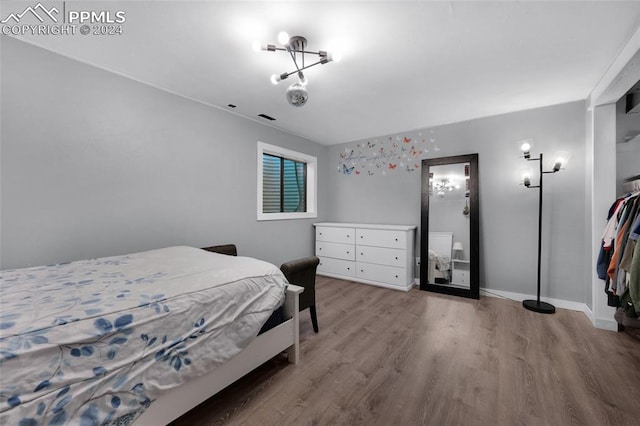 bedroom featuring hardwood / wood-style floors