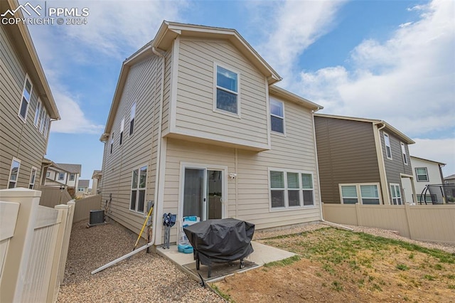 back of property featuring a patio area and central AC unit