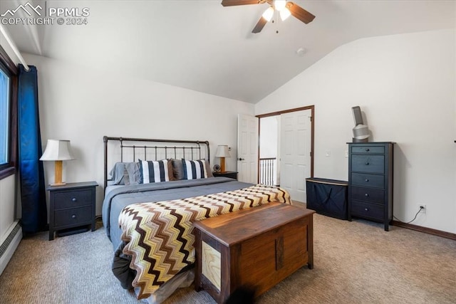 bedroom with vaulted ceiling, light colored carpet, a closet, and ceiling fan